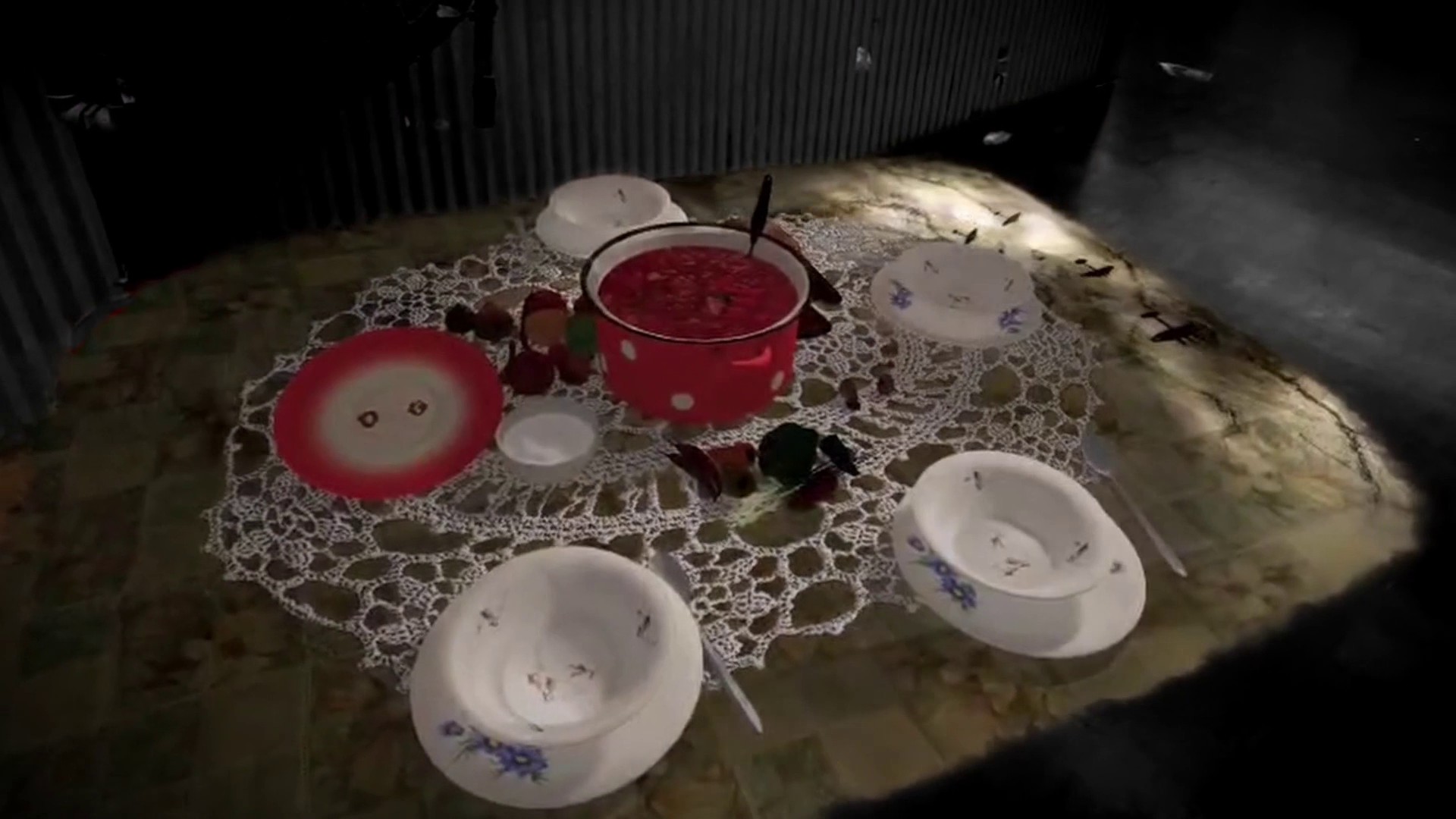 A laid table with a pot of borshch on a lace cloth.